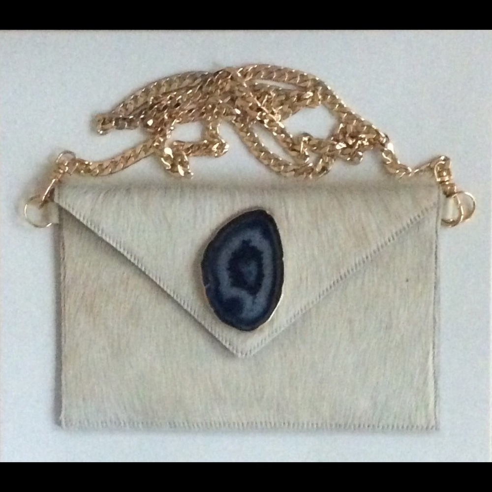 White cross body clutch